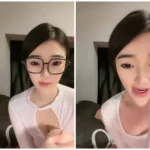 asian woman white top