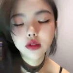petite asian girl with black choker