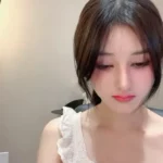 Petite Japanese Girl with Lace Bra Rides Pink Vibrator in Bedroom