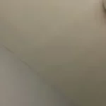 asian woman white top