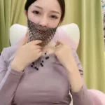 asian woman weighing scale