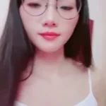 Dark-Haired Japanese Woman Fucks Pink Vibrator While Reclining on Bed with Green Sheets 16 asian woman stockings selfies