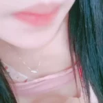 Slim Japanese Woman with Dark Straight Hair Rides Pink Vibrator Amidst Pastel Bedroom & Unicorn Plushie