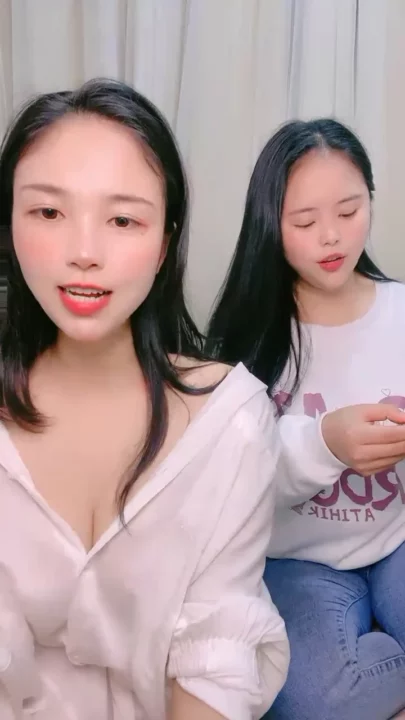 Screenshot 1 from Twin-Like Japanese Lesbians Scissor with Strapon — Bedroom POV Action
