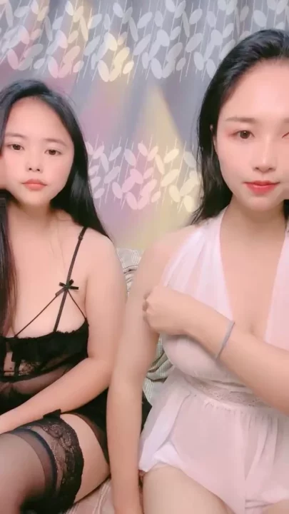 Screenshot 3 from Lulu and Her Companion Flaunt Lingerie in Asian Amateur Lesbian Tease — White Babydoll Delight