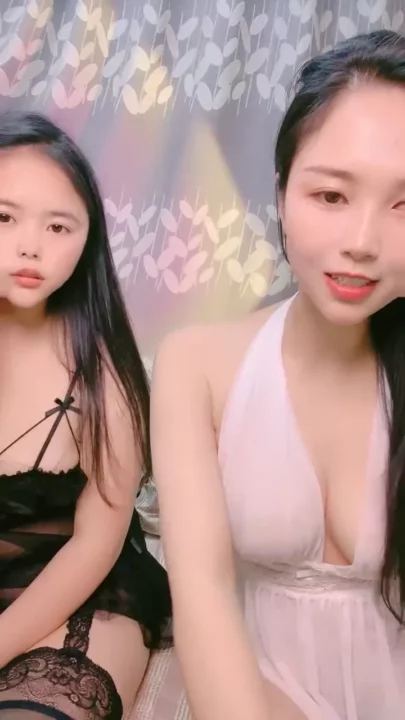 Lulu and Her Companion Flaunt Lingerie in Asian Amateur Lesbian Tease — White Babydoll Delight