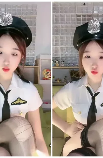 Screenshot 17 from Petite Asian Cam Girl Roleplays as Police Officer in Teasing Livestream