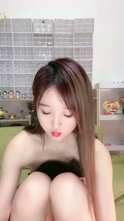 Screenshot 9 from Petite Asian Cam Girl Roleplays as Police Officer in Teasing Livestream