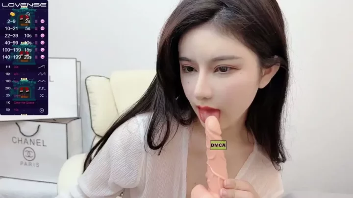 Screenshot 1 from Xiao’s Intense FC2 Livestream — POV Titfucking & Dildo Action in Office Setup