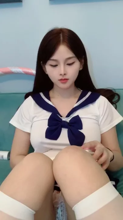 Screenshot 3 from Shanshan’s Sailor Outfit Solo Session — Asian Amateur Spreads Legs on Teal Couch