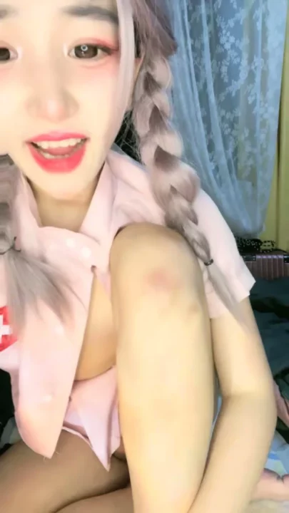 Solo Asian Nurse in Pink Teases with Dildo — Stockings & Shaved Pussy on Display のスクリーンショット 9