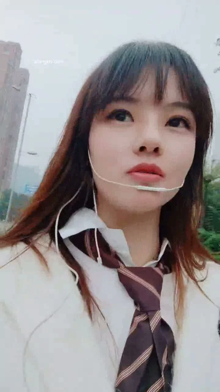 Play video: Timid Japanese Schoolgirl Solo Video — Full Face Visible in Park