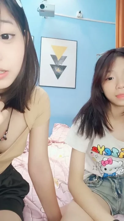 Screenshot 5 from Petite East Asian Twins in Raw Hotel Lesbian Encounter — Full Face Visible