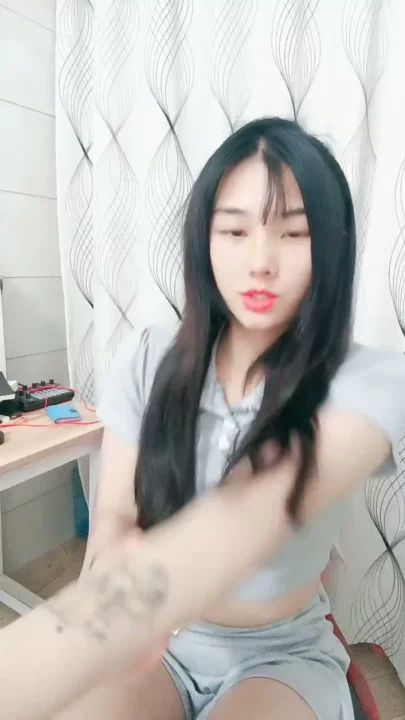 Screenshot 2 from Petite Asian Model in Gray Outfit — Bedroom POV Pose Shoot