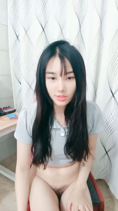 Screenshot 13 from Petite Asian Model in Gray Outfit — Bedroom POV Pose Shoot