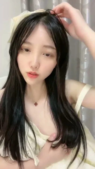 Screenshot 2 from Petite Asian Model Exposes Shaved Pussy in Cream Satin Robe — Sensual Lingerie Solo